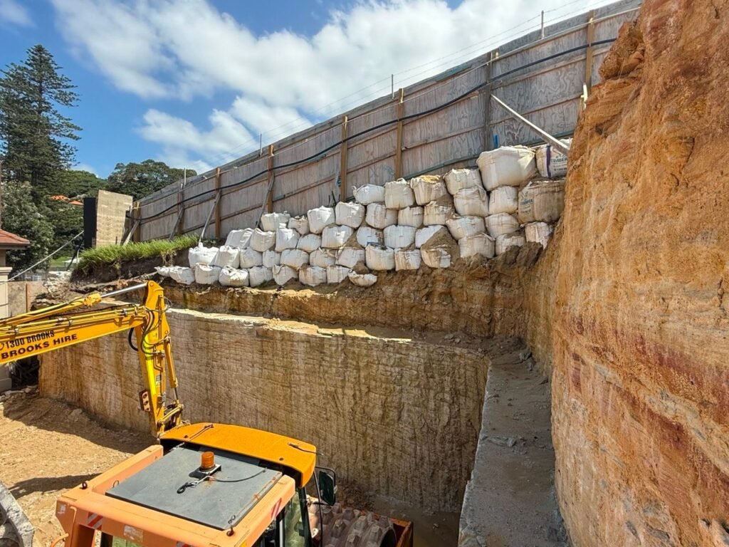 Excavation with boulder retaining wall at Bronte Surf Life Saving Club, NSW